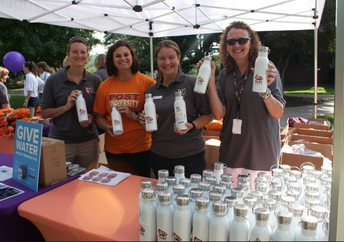 Custom water bottles at an event for Post University