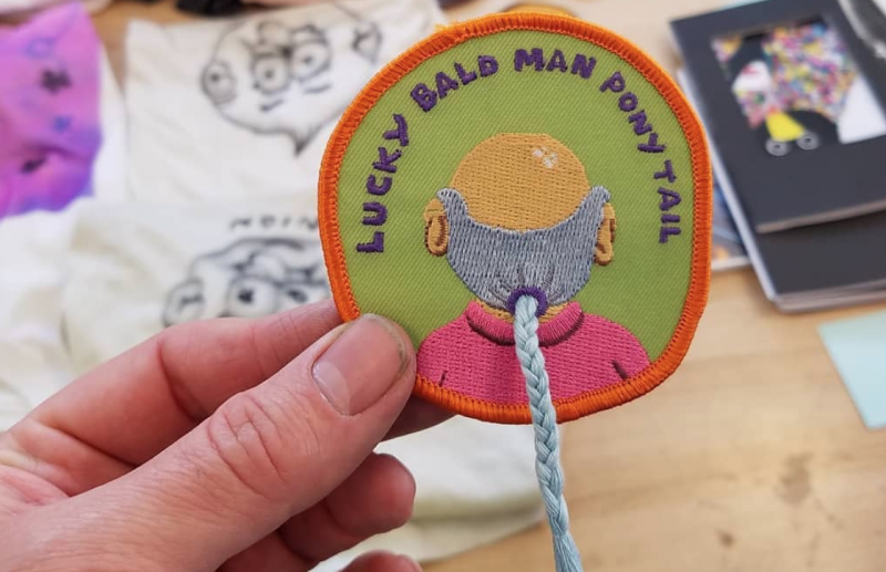 Lucky Bald Man Ponytail patch at TCAF 2019