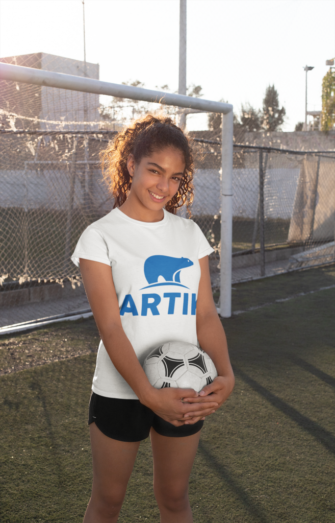 Teen age girl on soccer field